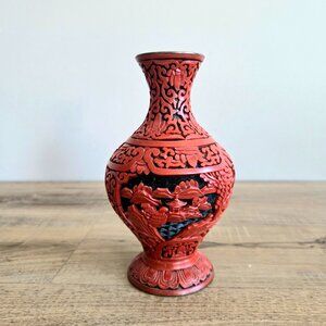 Vintage Chinese carved red Cinnabar vase with brass edging. Zen Pagodas.
